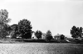 Gård med åker, 1909
