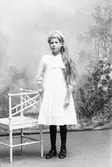 Flicka med långt hår, juli 1911