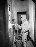 Målningsarbete i vagnverkstaden