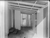 LANTARBETARBOSTAD I TARV
EXT. INT