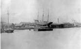 Härnösands varv 1872, Angantyr och skeppet Atle. Skeppet Alfa under koppring. Det enmastade fartyget längst till vänster är en haxe.