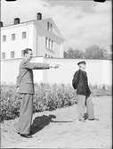 Två män vid Uppsala fängelse 1948