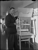 Man visar skolbänk, Domarringens skola, Uppsala 1948