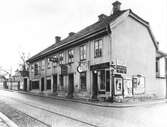 Södra Kungsgatan, kv. Värdshuset, Gävle med bl.a. Oscar Berglund Urmakeri & Urhandel.