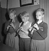 Tre blockflöjtelever i folkskolan i Örebro,  1947-10-10