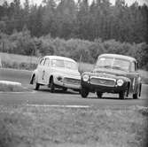 Två Volvo kubbas. Gelleråsen, Karlskoga. 1957-08-26