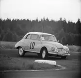 Gillmo smyger genom kurvan. Gelleråsen, Karlskoga. 1957-08-26
