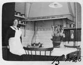 Kvinna i köket, 1925