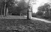 Kvinna vid ån, ca 1905