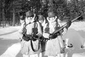 Militär trio med skjutvapen, 1962