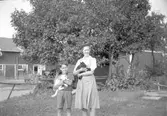 Par med katter, Stora Mellösa, 1930-tal