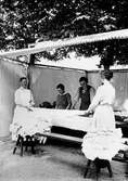 Strykning av tvätt vid arbetshuset, 1920-tal