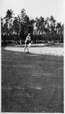 Löpare på idrottsanläggning, 1930-tal