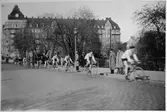 Tävlingscyklister på Storgatan, 1930-tal