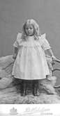 Flicka i sin fina klänning, efter 1890