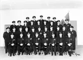 Brandkårens 50-årsjubleum, den 10 september 1950.

Första raden nedifrån, från vänster: 
Brandförman Torsten Lorentzon, brandförman Gösta Andersson, v. brandmästare Harry Andersson, v. brandchef Harald Karlborg, brandchef Anders Hedén, brandmästare Oscar Hägerhed, brandförman C.E. Lindebäck, brandman Bengt Olsson. 

Andra raden nedifrån, från vänster: 
Brandman Gerhard Bengtsson, brandman Bertil Andersson, brandman L.O. Karlborg, brandman Stig Ericsson, brandman Folke Blomqvist, brandman Torsten Hallgren, brandmästare Sune Vikström, brandman Bertil Andersson, brandman Arne Gustafsson, Åke Hallgren, brandman S.E. Mattsson. 

Tredje raden nedifrån, från vänster: 
Brandman Rune Bergsten, brandman Oscar Svensson, brandman Eric Pettersson, brandman Valter Jarlsvik, brandman Yngve Gustafsson, brandman Eric Hansson, brandman Eric Andersson, brandman Yngve Lövgren, brandman Fritz Johansson.

Fjärde raden nedifrån från vänster: 
Brandman Rune Bohlin, brandman Gunnar Johansson, brandman Inge Fredriksson, brandman Bo Arvidsson, brandman Stig Lycke.