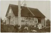 Brevkort - familjen Gustaf Andersson, markenteriet Tammsfors, Untra, Uppland efter 1912