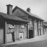 Trähus på Drottninggatan 37, 1956