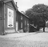 Hus vid bondegatsbacken, Bondegatan 1-7, 1956