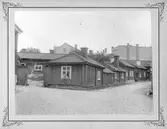Träkåkar vid Gamla gatan, 1891 före