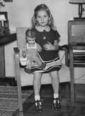 Flicka med docka, 1950-tal