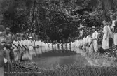 Missionär utför dop i Kongo, december 1935