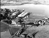 Vy över Graningeverkens såganläggning vid Bollstafjärden. Såghuset till höger.