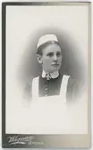 Kabinettsfotografi - kvinna i sjuksköterskeuniform