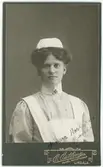 Kabinettsfotografi - kvinna i sjuksköterskeuniform