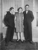 Kvinna och två män