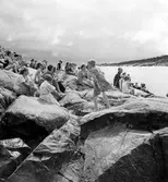 Människor på klippor