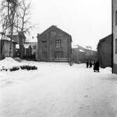 Stadsbebyggelse. I förgrunden till vänster tomt nr 3 från Köpmangatan, foto mot S.