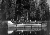 Bogserbåten S/S Notholmen lastad för avgång, 1920-tal