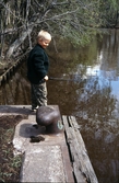 Pojke som fiskar vid vattenparken, 1997