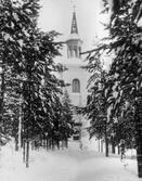 Junsele kyrka på vintern. Cirka 1925.