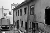 Rivning av fastighet på Drottninggatan, ca 1975