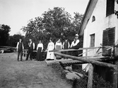 Grupp vid kvarnen i Vintrosa, 1920-tal