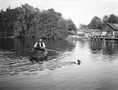Man i roddbåt, 1920-tal
