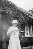 Kvinna med bakverk, 1920-tal