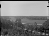 Utsikt, från Rocklundaberget, över Vallby friluftsmuseum i Västerås.