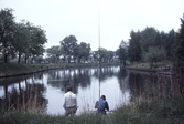 Deltagare vid fisketävling i Svartån, 1984