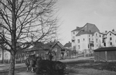 Häst och vagn på Allégatan i Hallsberg, 1944