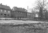 Barn leker på rivningstomt vid Drottninggatan, 1953