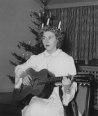 Gitarrspelande lucia, 1955