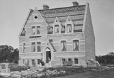 Stenhus på Nygatan, 1880