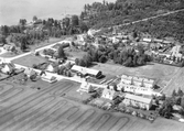 Flygfoto över Kilsmo samhälle från  öster, 1958