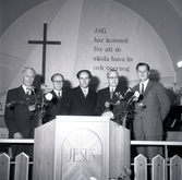 Fem herrar i kostym när Filadelfiakyrkan firade 25 år.