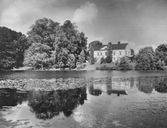 Vy mot gård i Åsbro, 1930-tal