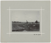 En man står vid en rest sten, Altuna socken, Uppland 1905