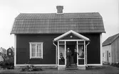 Familj på förstukvist, 1926